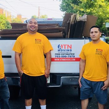 ATN Movers standing by a moving truck