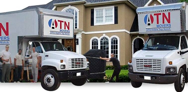 ATN Moving trucks in front of a house